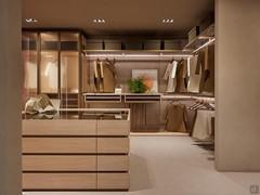 Horizon begehbarer Kleiderschrank mit Artemis Lounge Kleiderschrank - Horizon Insel mit lackierter Glasplatte vervollständigt den Raum