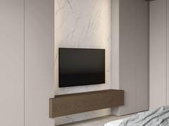 Lounge Boiserie aus Keramikstein Laminam Calacatta Gold