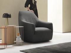 Layla cosy swivel armchair covered in fabric