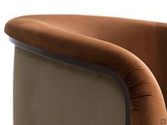 A close up of the curved backrest and the rounded edges which form the armrests