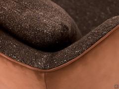 Detail of backrest and edge of Amanda armchair