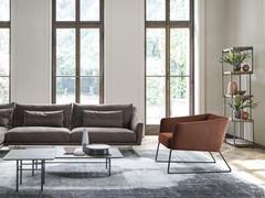 Nikos accent armchair by Bonaldo, paired with the Skid sofa