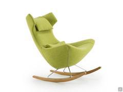 Olivia wingback rocking armchair in Summer pistacchio colour  fabric