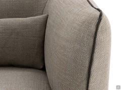 Detail of the soft, enveloping shapes of the armrests