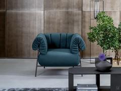 Armchair Tirella with soft and enveloping armrests and backrest