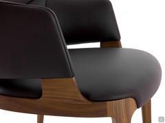 Close-up of the seat and armrests upholstered in the full-grain Lord leather in a dark brown shade