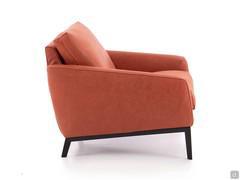 Side view of the Medea leather armchair