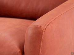 Detail of the armrest of the Tivano leather lounge chair