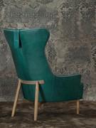 Laurel design armchair with tall backrest and wooden structure