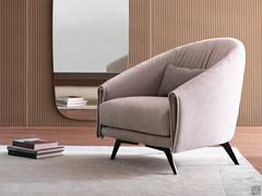 Armchair Saddle by Bonaldo with a curved, enveloping backrest