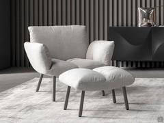 Pil upholstered armchair by Bonaldo with low seat and metal frame - here it is paired with the matching pouffe (unavailable)