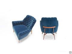 Lynn armchair in the tufted capitonné model with metal base