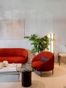 Lounge seating consisting of armchair and Yoisho sofa with red fabric upholstery