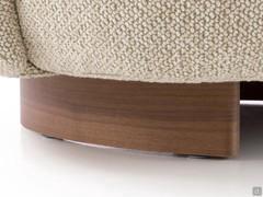 Detail of the curved solid wood base with American walnut finish