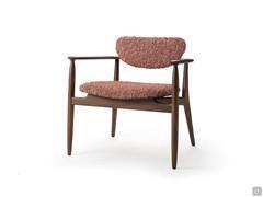 Retro style armchair covered in fabric, with structure and armrests in hand-shaped canaletto walnut