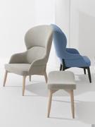 Sophos modern upholstered armchair in bergere version with matching fabric ottoman