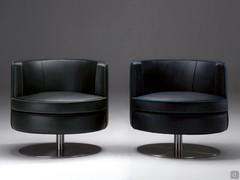 Charme armchairs upholstered entirely in leather in the cut-stitching version