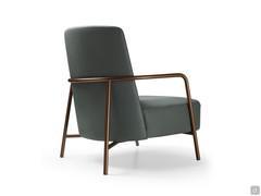 Detail of the tubular metal frame that supports and frames the Maggie armchair