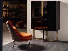 Cantori's Aurora armchair with two-tone upholstery paired with Mirage sideboard