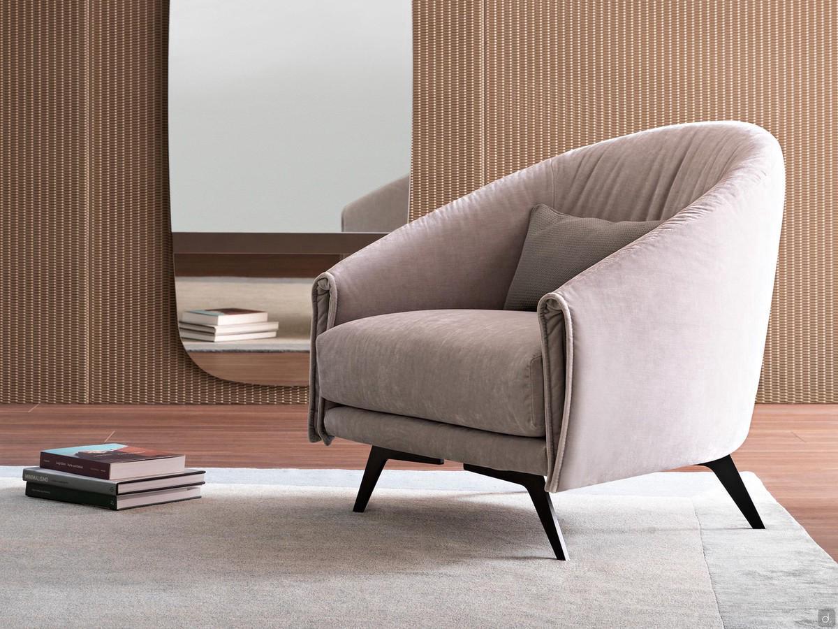 Armchair Saddle by Bonaldo with a curved, enveloping backrest