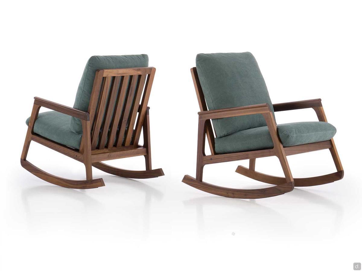 Rocking armchair Yumi with a solid walnut frame that denotes skilled craftsmanship