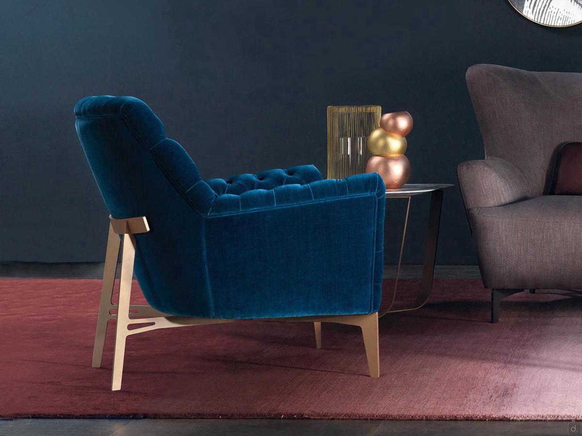 Lynn elegant armchair with mono-colour, tufted Capitonné upholstery in velvet and metal base