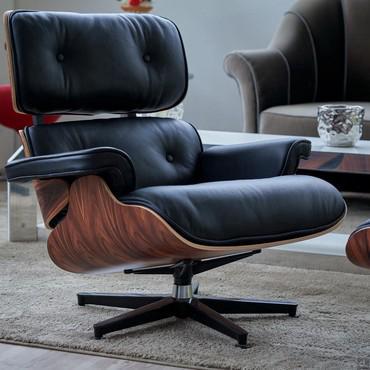 The Eames armchair, a replica inspired by Charles Eames’ design, is available in wood, leather or fabric