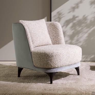 Amanda low armchair without armrests and with a backrest cushion