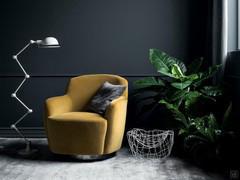 Yoko swivel armchair with armrests and low backrest, upholstered in mustard yellow velvet and with polished black chrome metal base