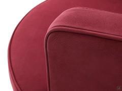 Detail of the close-fitting Nubuck leather upholstery, finished with matching piping