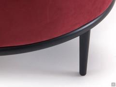 Detail of the four-foot fixed base, made of metal in multiple finishes, shown here in Anodic Black