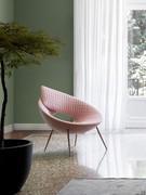 Lock design armchair by Bonaldo, here proposed with quilted upholstery in pink fabric