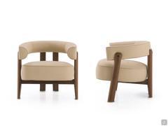 Front and side views of the Tilde armchair highlighting its compact volumes