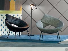 Lock design armchair by Bonaldo, in versions with quilted fabric cover and leather cover