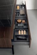 Functional nailhead-opening drawers and interior organizers in orion gray finish