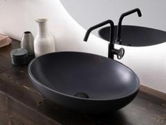 Detail of the countertop basin in Mineal material colour matt charcoal