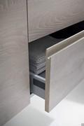 Detail of the drawers with metal frame and recess