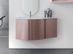 Atlantic curved bathroom furniture in the suspended version, with curved side end unit to complete the composition