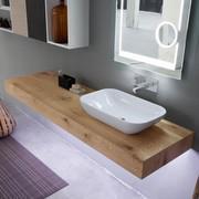 Detail of the big veneer shelf in finish 845 pure oak with countertop basin in ceramic