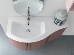 Mineralguss washbasin with contoured profile. Sinuous lines with pleasing change in depth