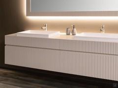 A glimpse of slatted MDF fronts: the perfect "positive-negative" scanning stands out, and the gap between one base and the other is not noticeable (wash-basins model no longer available)