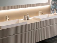 Three-quarter view of the washbasin bases with the double basin built-in top (wash-basins model no longer available)