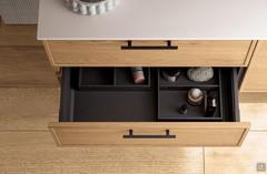 Detail of drawer organizers, optionally available on all Frame Consolle bathroom cabinets with pull-out fronts