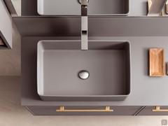 The Milano washbasin in Minera-Kolor is available in the same colors as the tops and base units, for an elegant solid-color composition