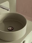 Detail of the Trieste washbasin in Minera-Kolor, offered as standard with the Frame N106 composition and always matching the top and base units