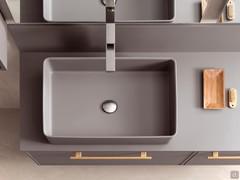 Milano washbasin in Minera-kolor. The Frame countertop vanity unit can be customized with a wide selection of different all-out washbasins