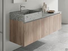 Bathroom furniture with countertop Atlantic washbasin with Land stoneware washbasin, combined with Atlantic base units of equal depth with countertop and splashback matching the washbasin