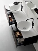 Double all-surface Roma model washbasin in high-gloss white ceramic, on two Atlantic base units made from a single top