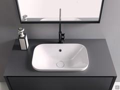 Detail of the Movado 58 glossy white ceramic countertop basin