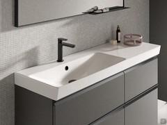 Off-centre 121 cm Set Up bathtub, available in both left and right versions for particularly wide base units. On request it is also possible to divide the single wide front into two elements of reduced width (as in photo)